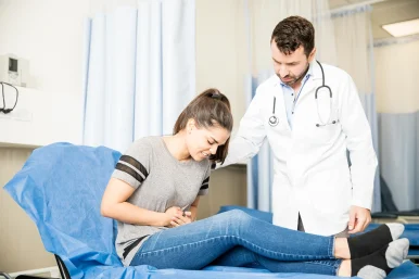 beautiful-young-woman-having-severe-stomach-ache-visiting-doctor-treatment 2